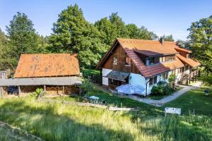 an aerial view of a house with a garden at Landhaus Graf in Kniebis