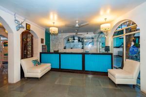 The Tamarind Hotel - A Boutique Heritage Stay, Anjuna - Goa的休息区