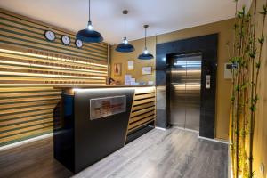 Kuchyň nebo kuchyňský kout v ubytování Hotel Tbilisi Central by Mgzavrebi