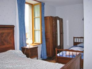 Een bed of bedden in een kamer bij La coet