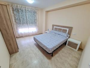 Postel nebo postele na pokoji v ubytování Las Jarcias 3A