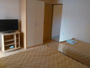 Postel nebo postele na pokoji v ubytování Apartments Zora