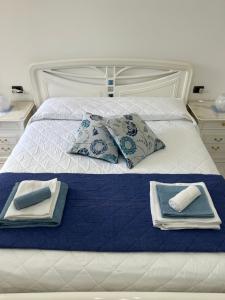 En eller flere senge i et værelse på La Minicasa