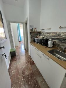 Kuchyň nebo kuchyňský kout v ubytování Ortigia D'amare + 20 fotografií