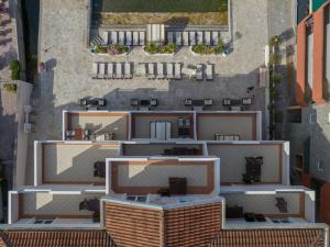 an overhead view of an apartment building with balconies at Apartments Adeona in Tivat