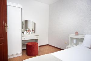 Кровать или кровати в номере Apartments Adeona