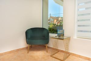 Гостиная зона в Apartments Adeona