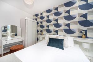 Кровать или кровати в номере Apartments Adeona