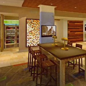 a dining room with a table and chairs in a store at Holiday Inn Express & Suites Camarillo, an IHG Hotel in Camarillo