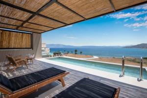 a view of the ocean from the patio of a villa at Balos Beach in Kissamos +37 photos