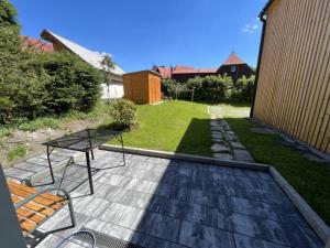 Vonkajšia záhrada v ubytovaní Apartmány VOLF - Boží Dar