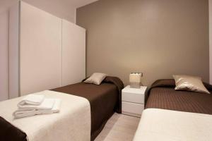 Posteľ alebo postele v izbe v ubytovaní Bed&BCN Enamorats