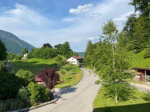 an empty road in a village with a house at Fagererhof in Bad Reichenhall