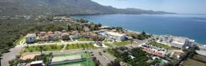 an aerial view of a town next to the water at Elite City Resort in Kalamata +37 photos