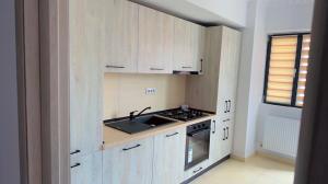 Kuchyň nebo kuchyňský kout v ubytování YES HOME ERK