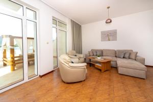 Гостиная зона в Apartments Adeona