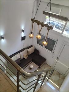 an overhead view of a living room with a couch at M&S Corfu Centre Apartment in Ágios Rókkos +10 photos