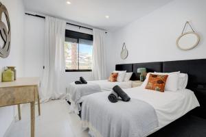 Posteľ alebo postele v izbe v ubytovaní Luxurious Apartment at Estepona Hills with stunning views + 37 fotografií