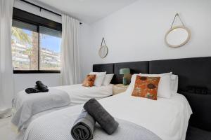 Posteľ alebo postele v izbe v ubytovaní Luxurious Apartment at Estepona Hills with stunning views