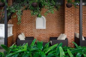 Area soggiorno di Hotel Thrive, A Tropical Courtyard