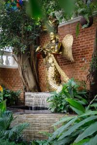 Giardino di Hotel Thrive, A Tropical Courtyard