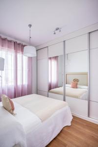 Posteľ alebo postele v izbe v ubytovaní Apartamento Leyendas de Becquer A4