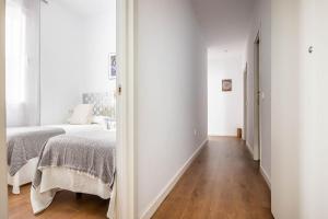 Posteľ alebo postele v izbe v ubytovaní Apartamento Leyendas de Becquer A4
