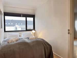 Un ou plusieurs lits dans un hébergement de l'établissement One Bedroom Apartment In Glostrup, Hovedvejen 182,