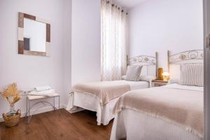 Posteľ alebo postele v izbe v ubytovaní Apartamento Leyendas de Becquer A4