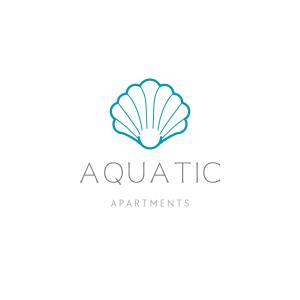 Logotipo acuático con cáscara sobre fondo rosa en AQUATIC Apartments Sarande, en Sarandë