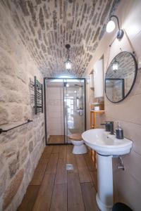 a bathroom with a sink and a toilet at Regina di Dobrota in Kotor