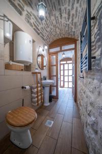 a bathroom with a toilet and a sink at Regina di Dobrota in Kotor