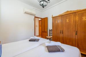 Postel nebo postele na pokoji v ubytování Son Sant Joan