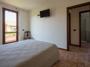 Postel nebo postele na pokoji v ubytování Apartment in Lazise near Lake Garda