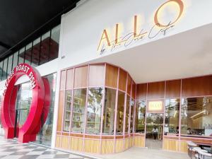 a store front of aldi with a sign on it at Arte Mont Kiara By The Relax Stay Kualalumpur in Kuala Lumpur