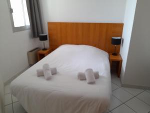 Posteľ alebo postele v izbe v ubytovaní VVF Résidence Port-Leucate + 34 fotografií