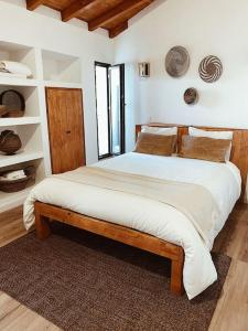 En eller flere senge i et værelse på Esteva CountryHouse