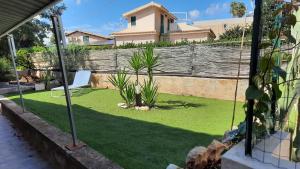 A garden outside A'MA CASA