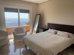 Postel nebo postele na pokoji v ubytování Vista Fraile- Atico en la Costa Cálida