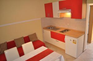 Kuchyň nebo kuchyňský kout v ubytování Apartments Zora