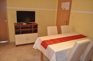 TV a/nebo společenská místnost v ubytování Apartments Zora