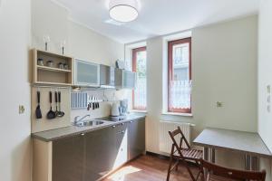 Kuchyňa alebo kuchynka v ubytovaní Rosa Weneda by Baltic Home