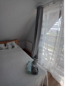 Postel nebo postele na pokoji v ubytování Domki Grażyna