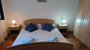 Katil atau katil-katil dalam bilik di apartmani DIMIĆ