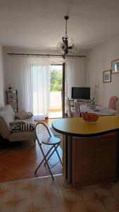 Televisyen dan/atau pusat hiburan di apartmani DIMIĆ
