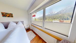 Nespecifikovaný výhled na hory nebo výhled na hory při pohledu z apartmánu
