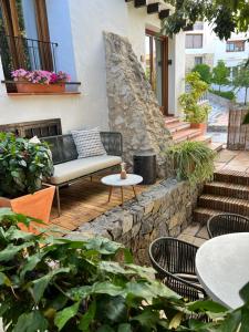 Posezení v ubytování Hostal del vino LA COSTERA