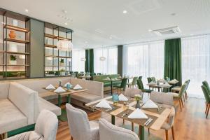 Posezení v ubytování H+ Hotel Frankfurt Eschborn