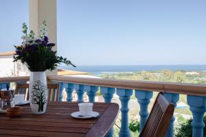 A balcony or terrace at Appartamenti Costa - BUDONI SWEET HOME