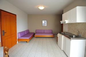 A kitchen or kitchenette at Stavroula Hotel Palace